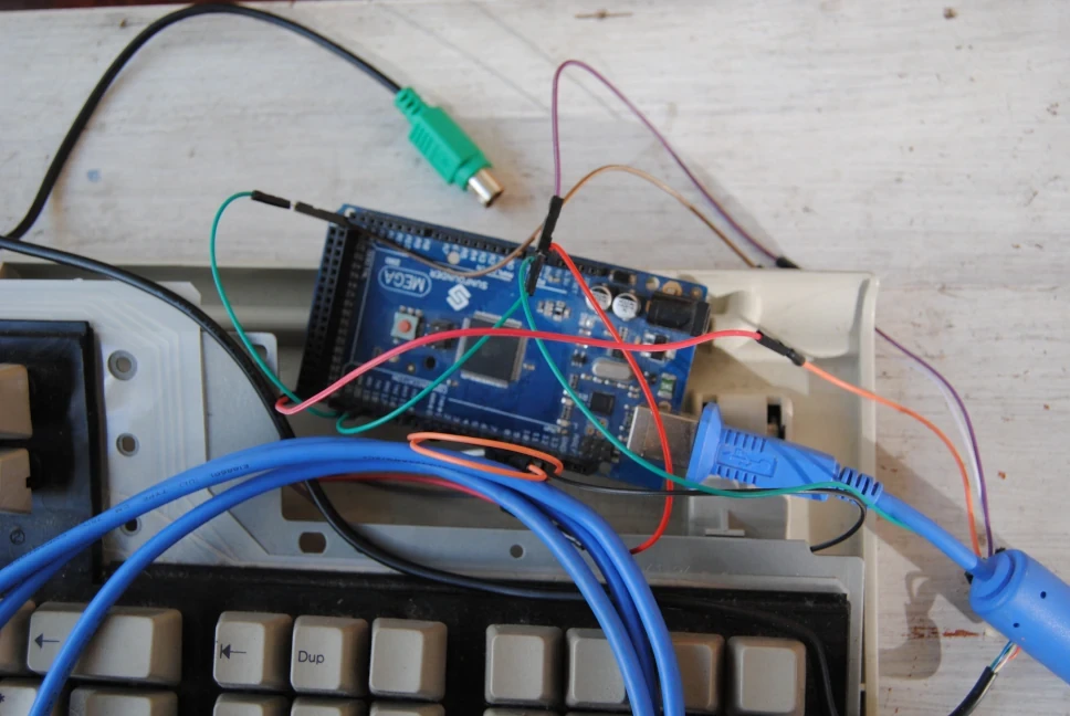 The Arduino Mega is connected to the keyboard and to a PS/2 cable.