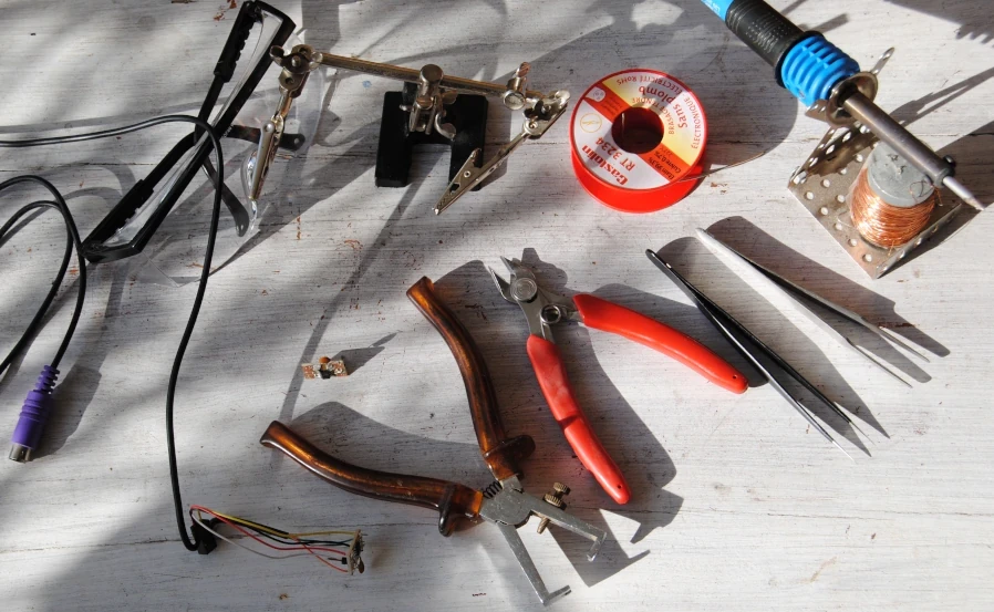 Soldering the components and wires.